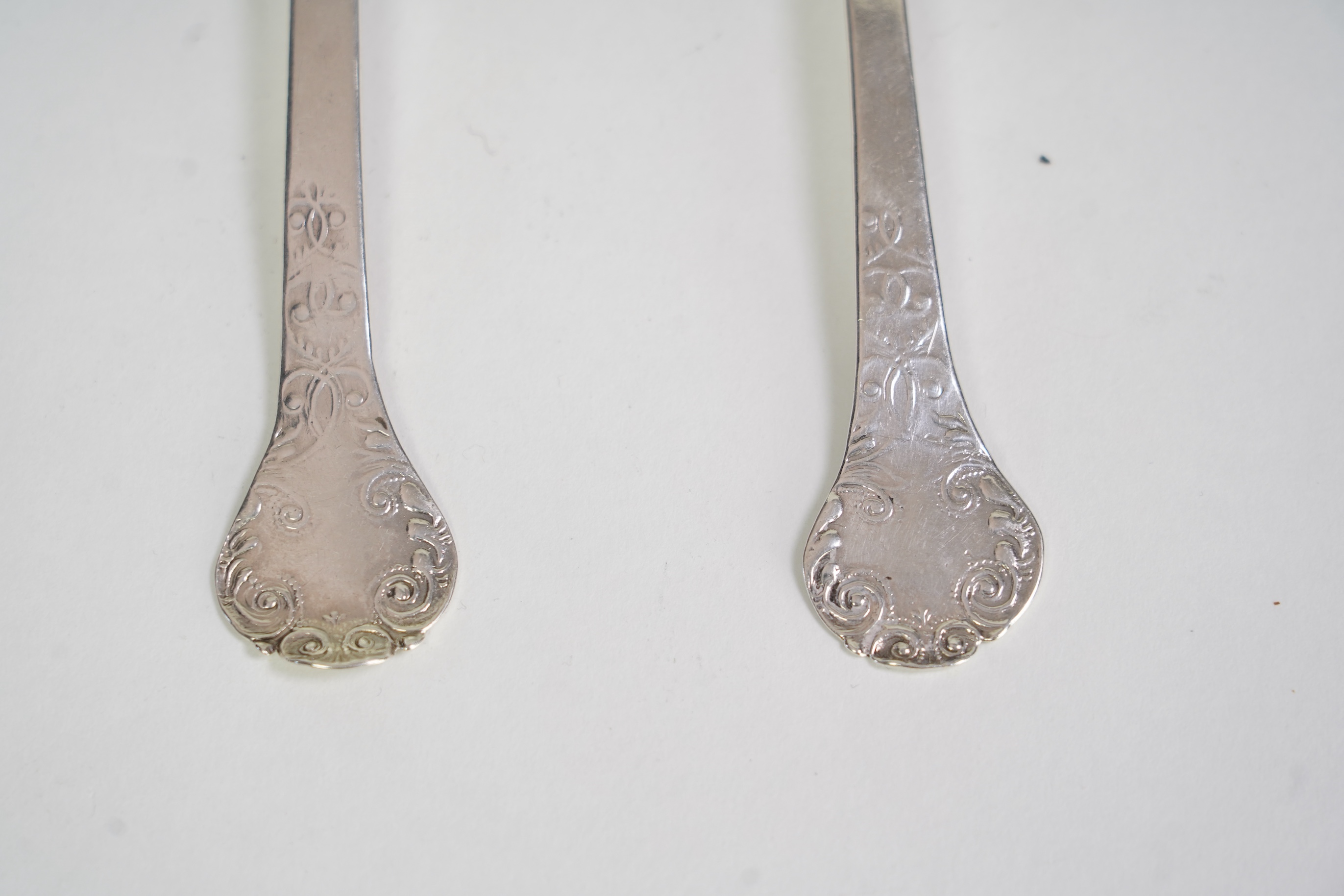 A pair of Charles II silver lace back trefid spoons, maker PL (Jackson's ref. p.137)